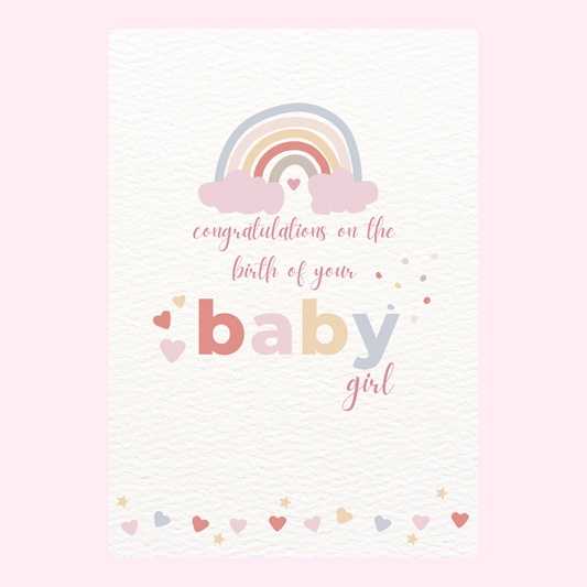 Baby girl congratulations card with rainbow design.