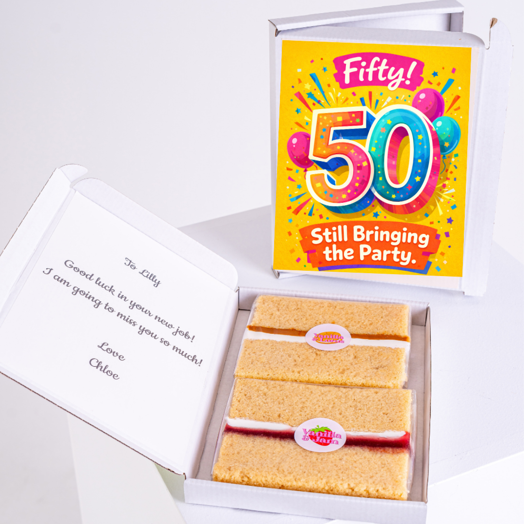 colorful 50th birthday cake card with sponge slices in box