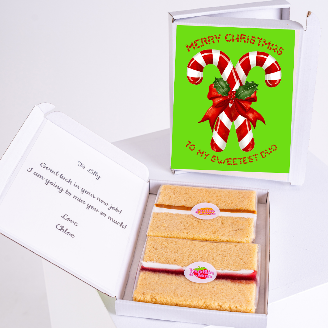 Christmas gift box with candy canes and cake, Lily's new job.