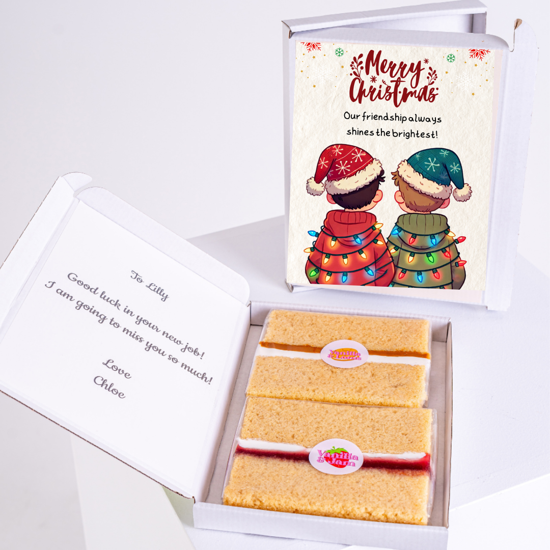 Christmas gift box with cake, card, and message for Lilly.