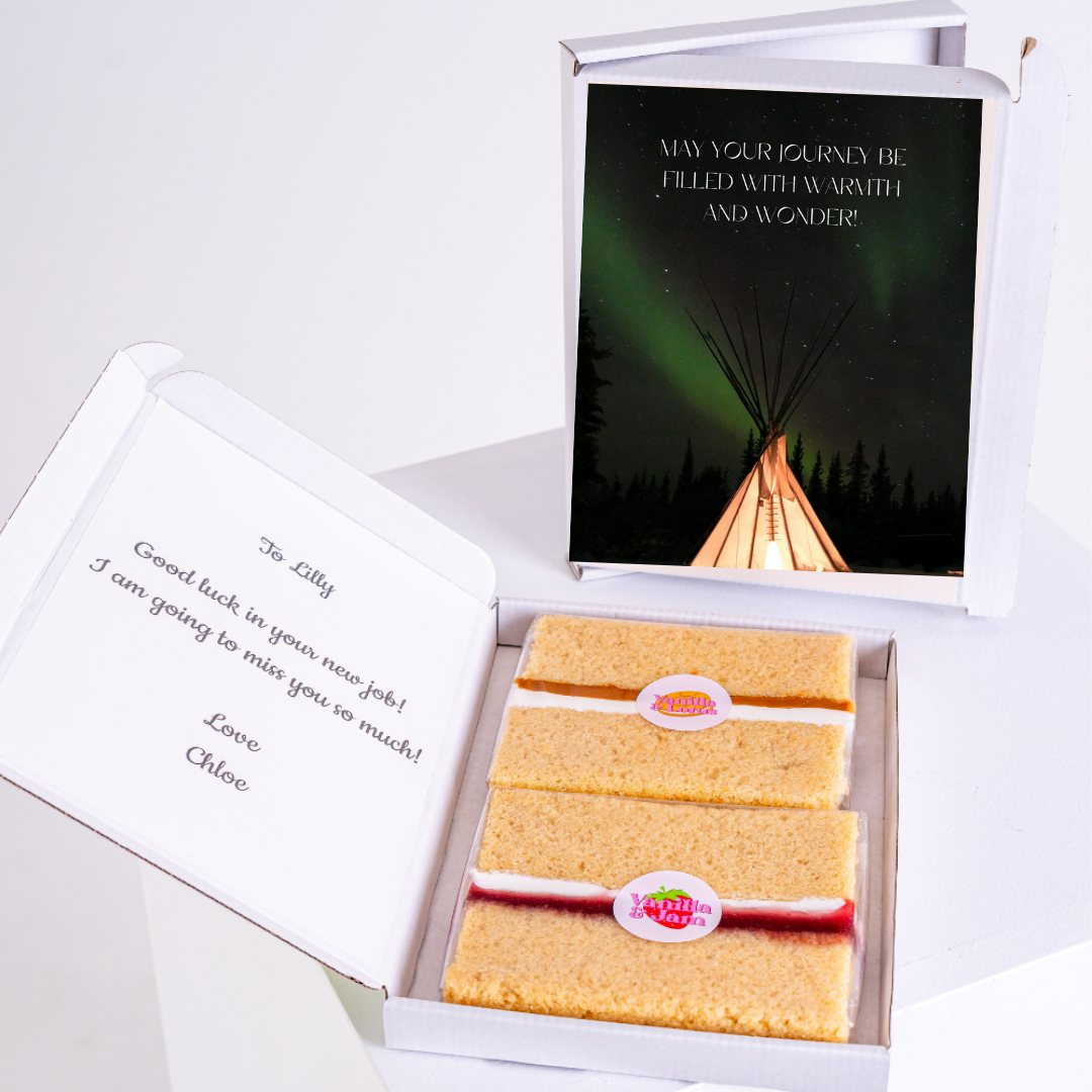 Farewell gift box with cake and card for Lilly, good luck message.