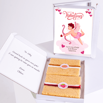 Valentine's Day gift box with cake, card, and message for Lilly.