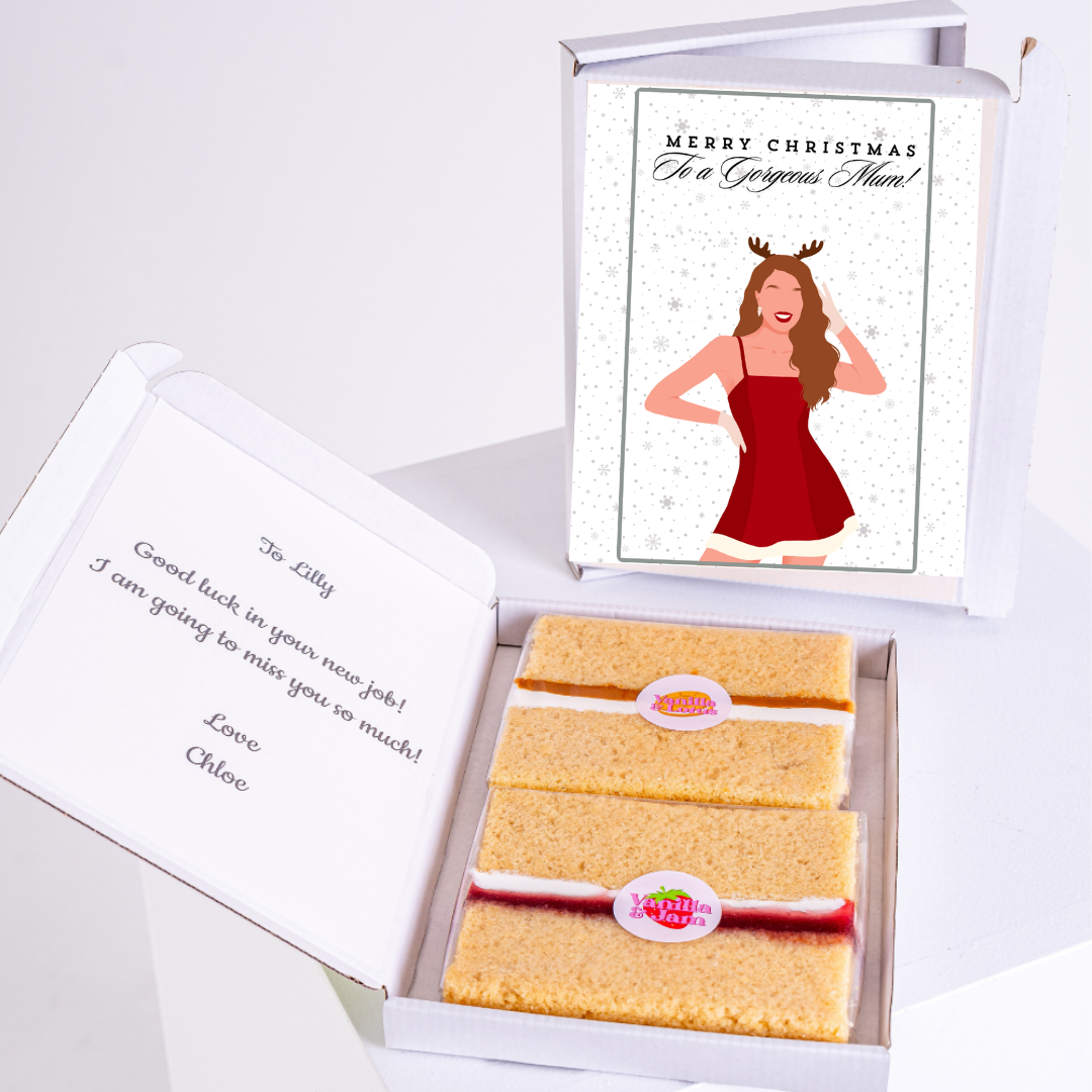 Christmas gift box for Lilly, featuring cake and card.