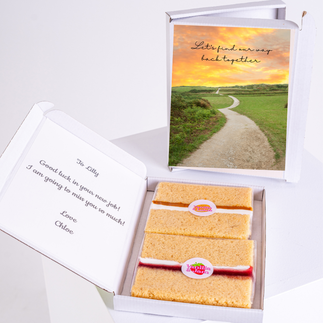 Cake gift box with card saying Good luck and Let's find our way back together