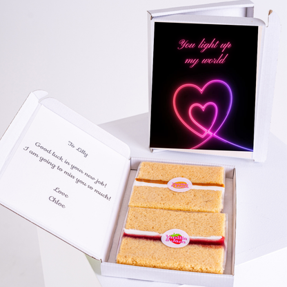 Farewell gift box with cake and You light up my world card.