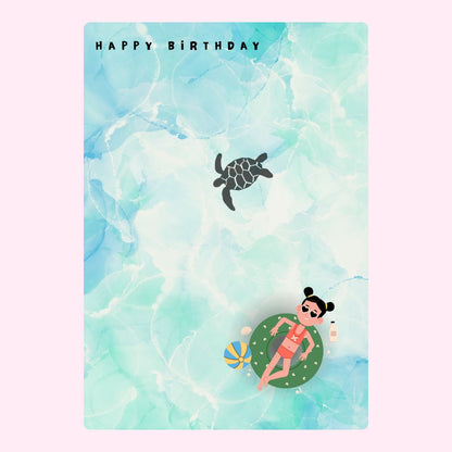 Happy Birthday card with girl, turtle, and ocean background.