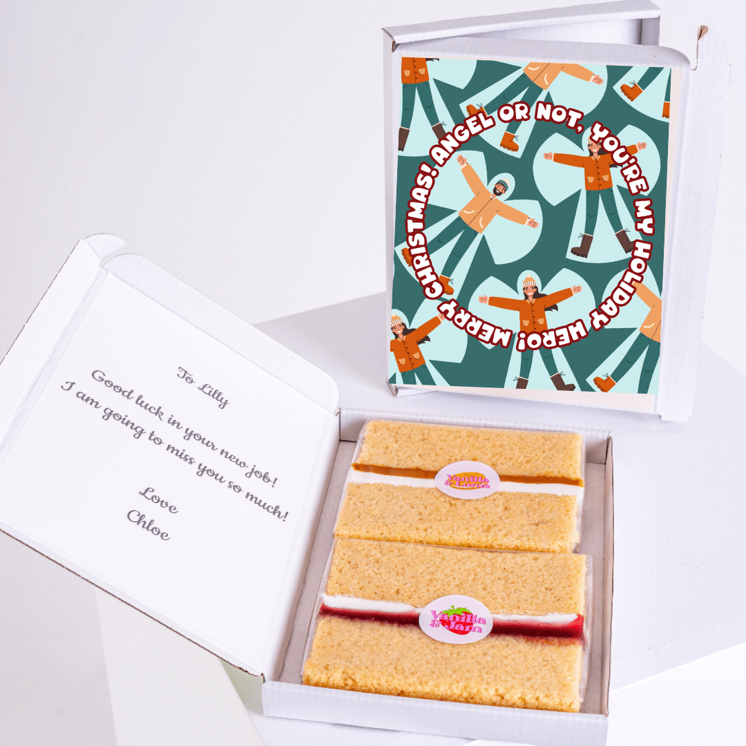 Cake slices in a box with a greeting card.