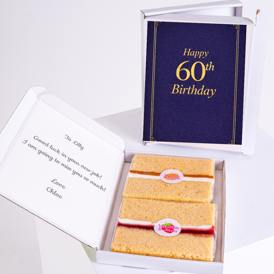 navy 60th birthday cake card with sponge slices in box