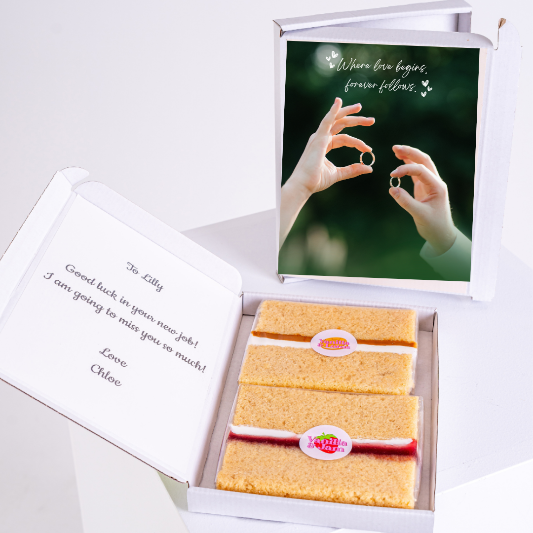 Gift box cake with rings, message, & Good luck card.
