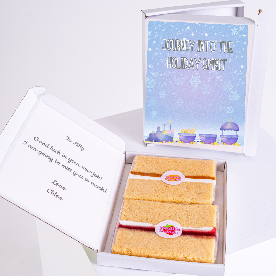 Farewell gift box with cake, Journey into the Holiday Spirit theme, and note...
