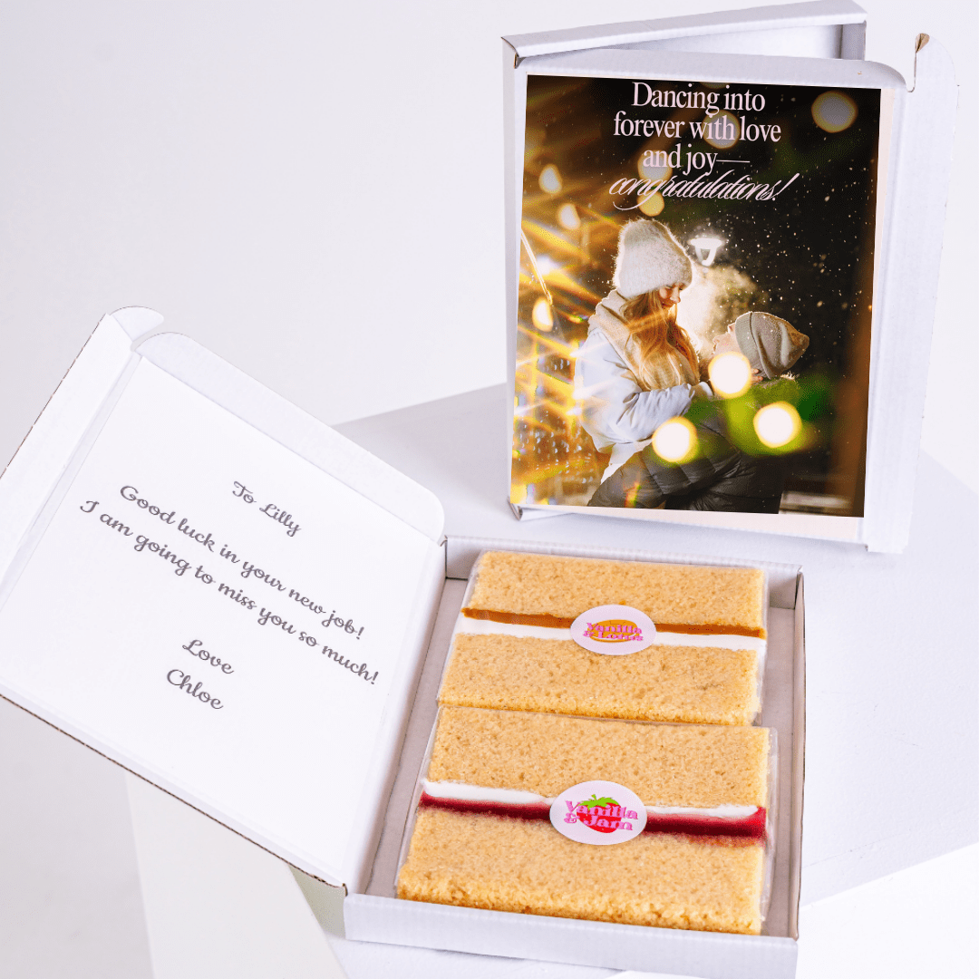 Gift box with cake and Good luck message.