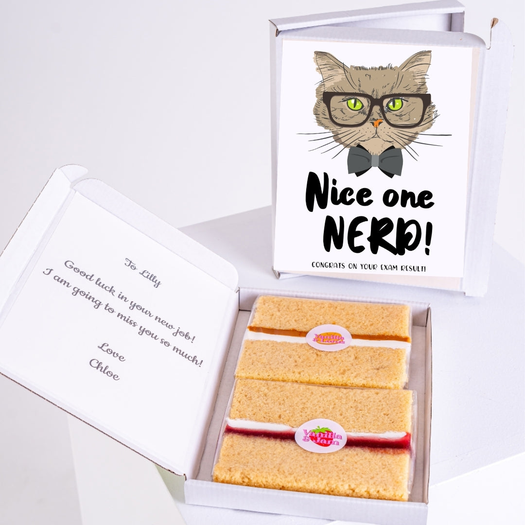 Box with cake and “Nice One Nerd!” message for exam results.