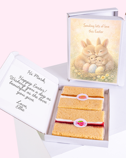 Easter Bunny family with a gift box in the background and message inside the box.