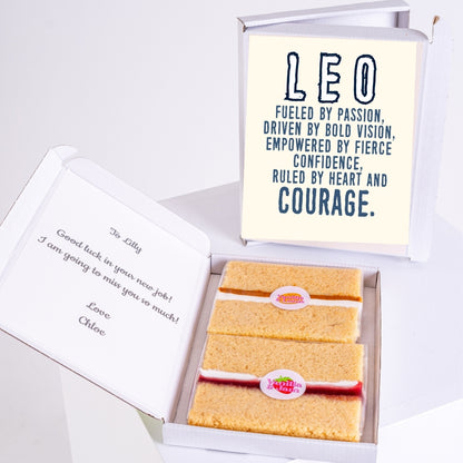 Gift box with Leo message and two cake slices.