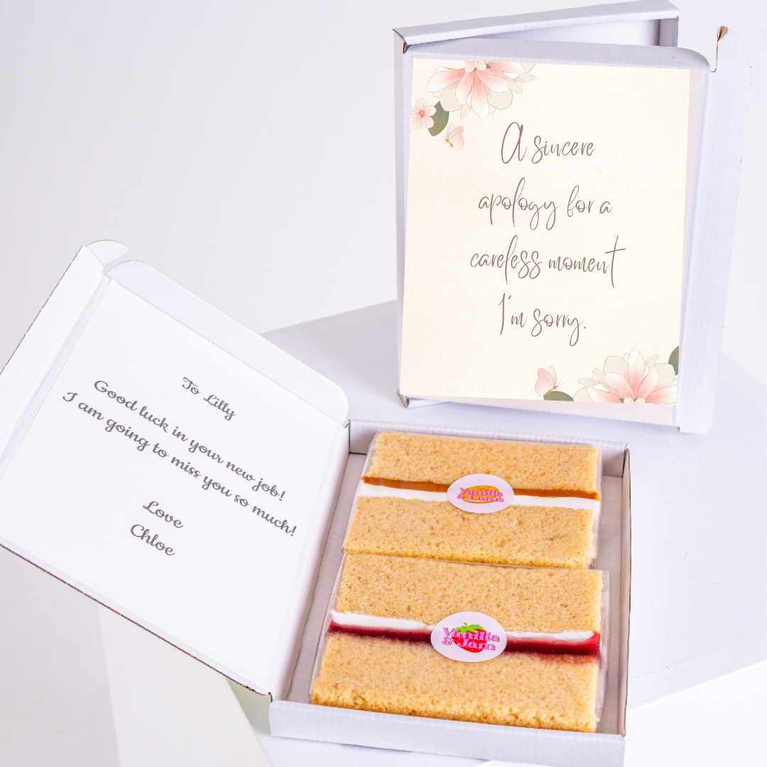 Gift box with apology card and cake slices.