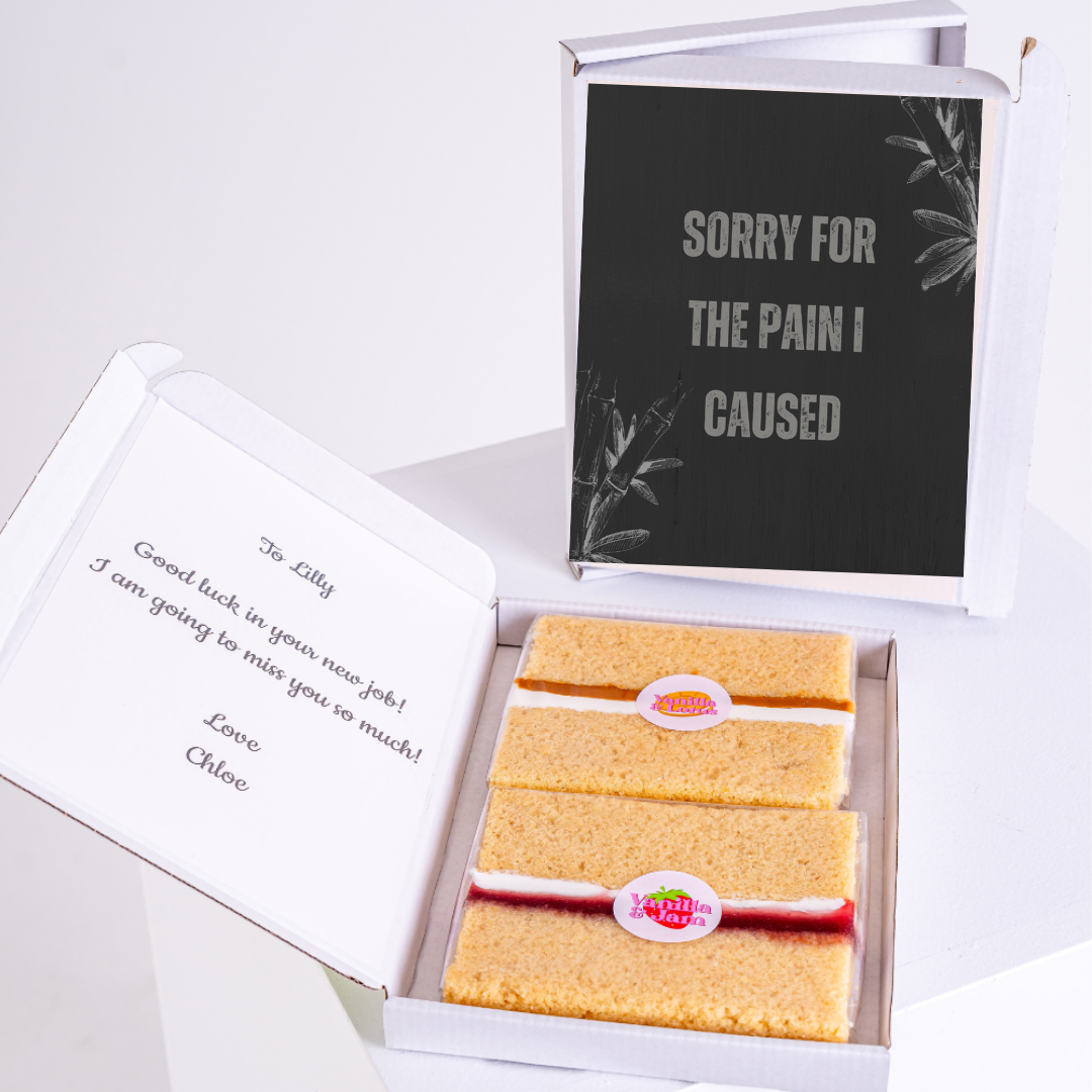 Gift box with slices and 'Sorry for the pain I caused' card.