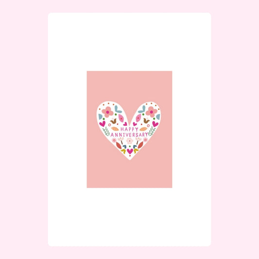Happy Anniversary floral heart design on soft pink background.