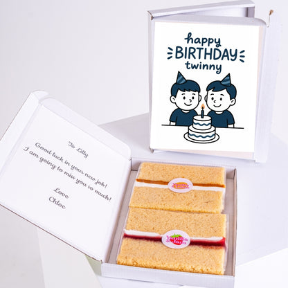 Letterbox birthday cake gift with twin design and personal message.