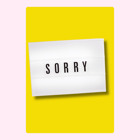 Lightbox sign with ‘SORRY’ on yellow.