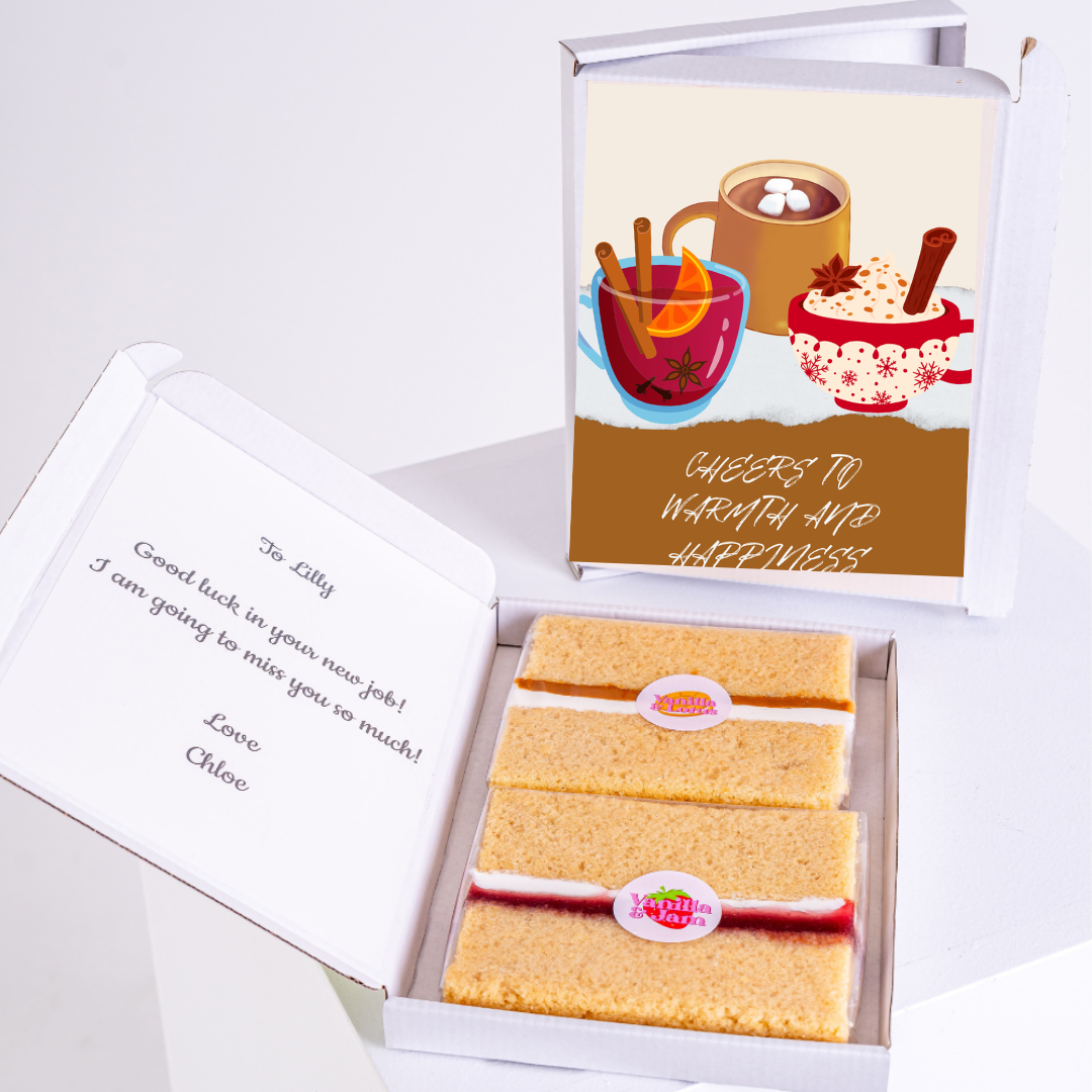 Gift box with cake and Cheers to Warmth and Happiness design.