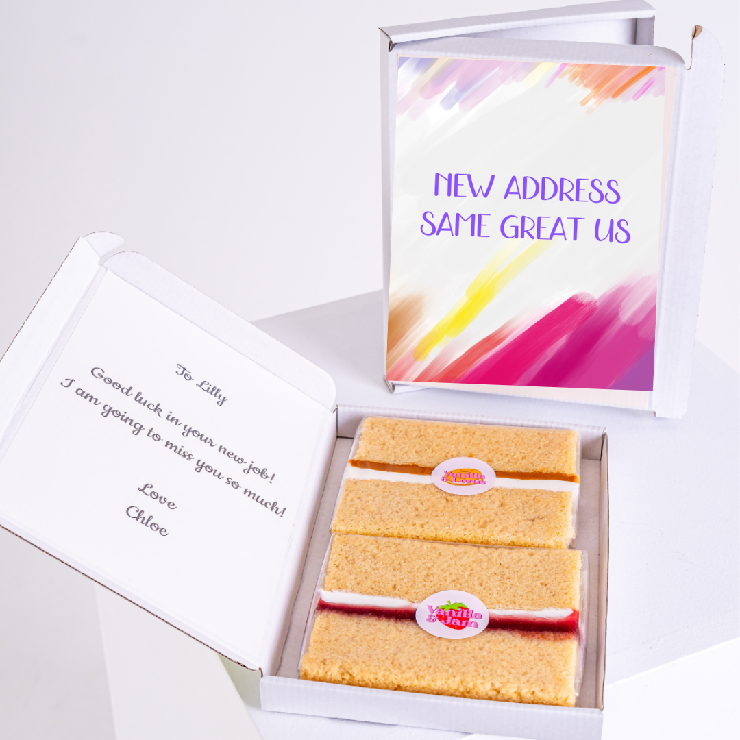 Farewell cake box with New Address, Same Great Us message.