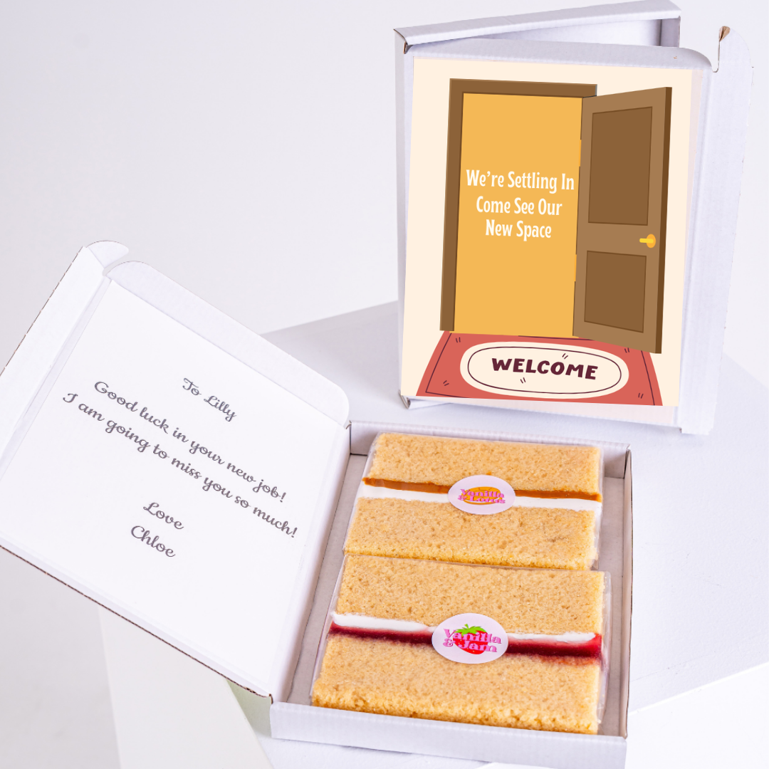 Cake box with welcome message and goodbye note.