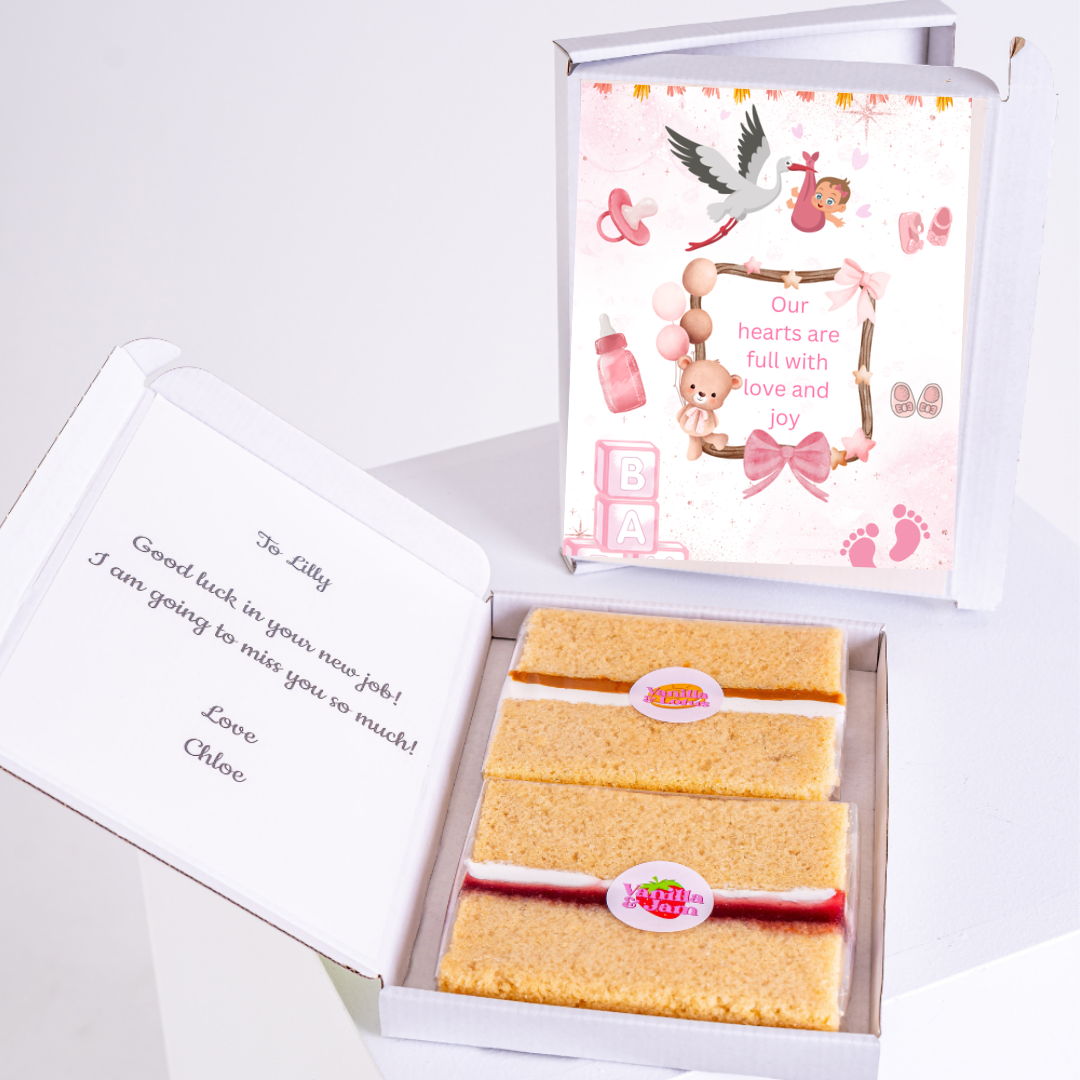 Baby shower cake gift box with note and cake slices.