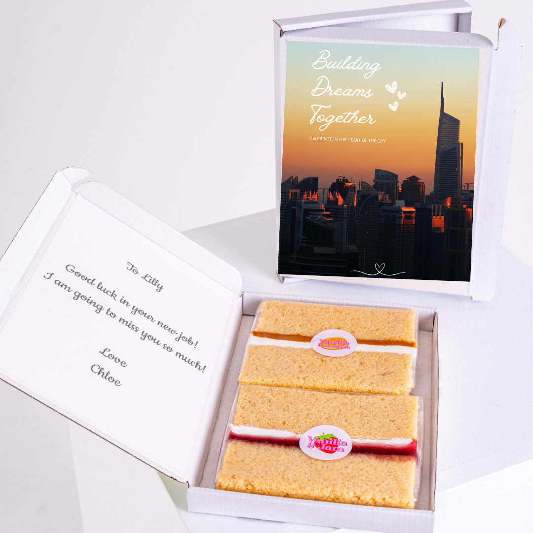 Gift box with cake and Building Dreams Together card, for Lilly.