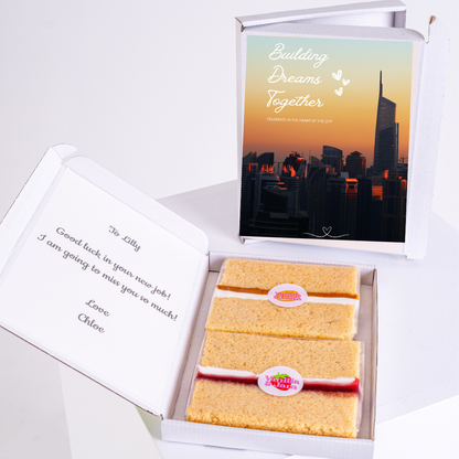 Gift box with cake and Building Dreams Together card, for Lilly.