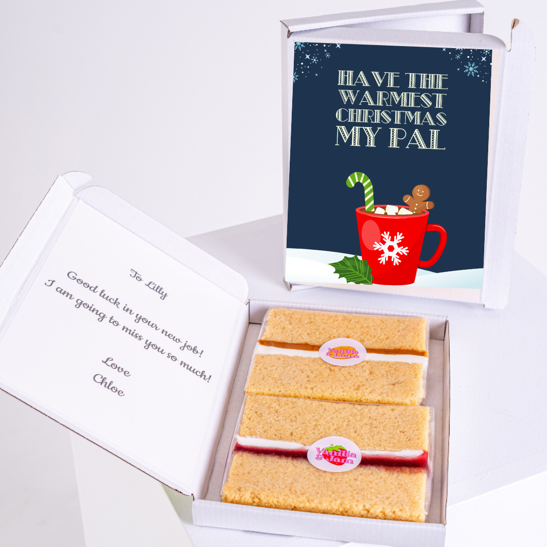 Christmas gift box with cake and message Have the warmest Christmas my pal