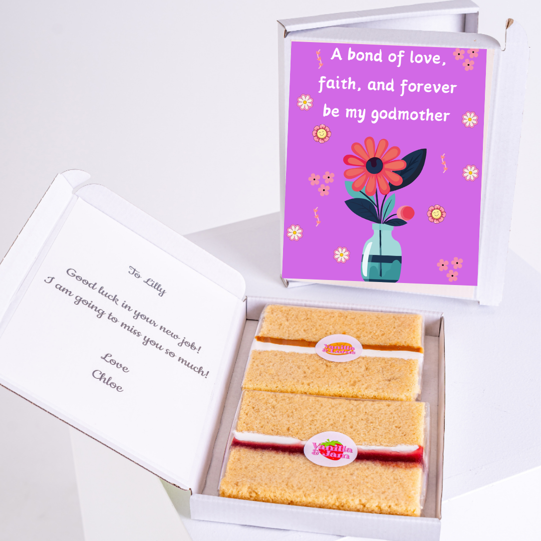 Gift box with cake and a godmother card.