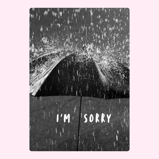 I'm Sorry card with umbrella in the rain