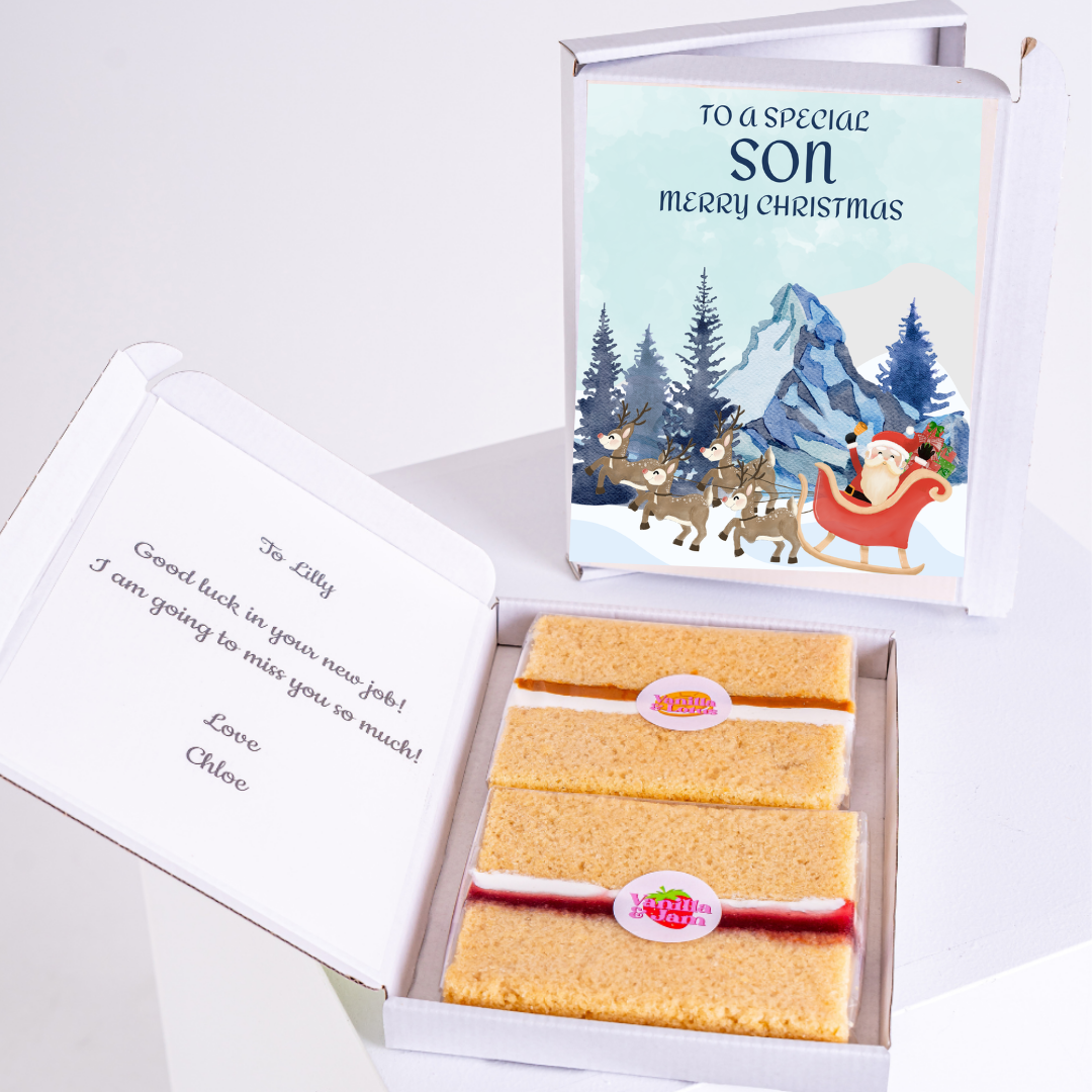 Christmas gift box with cake and son card