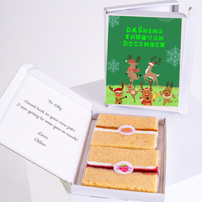 Christmas gift box with Dashing Through December design and cake.