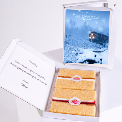 Holiday gift box with cake and note to Lilly