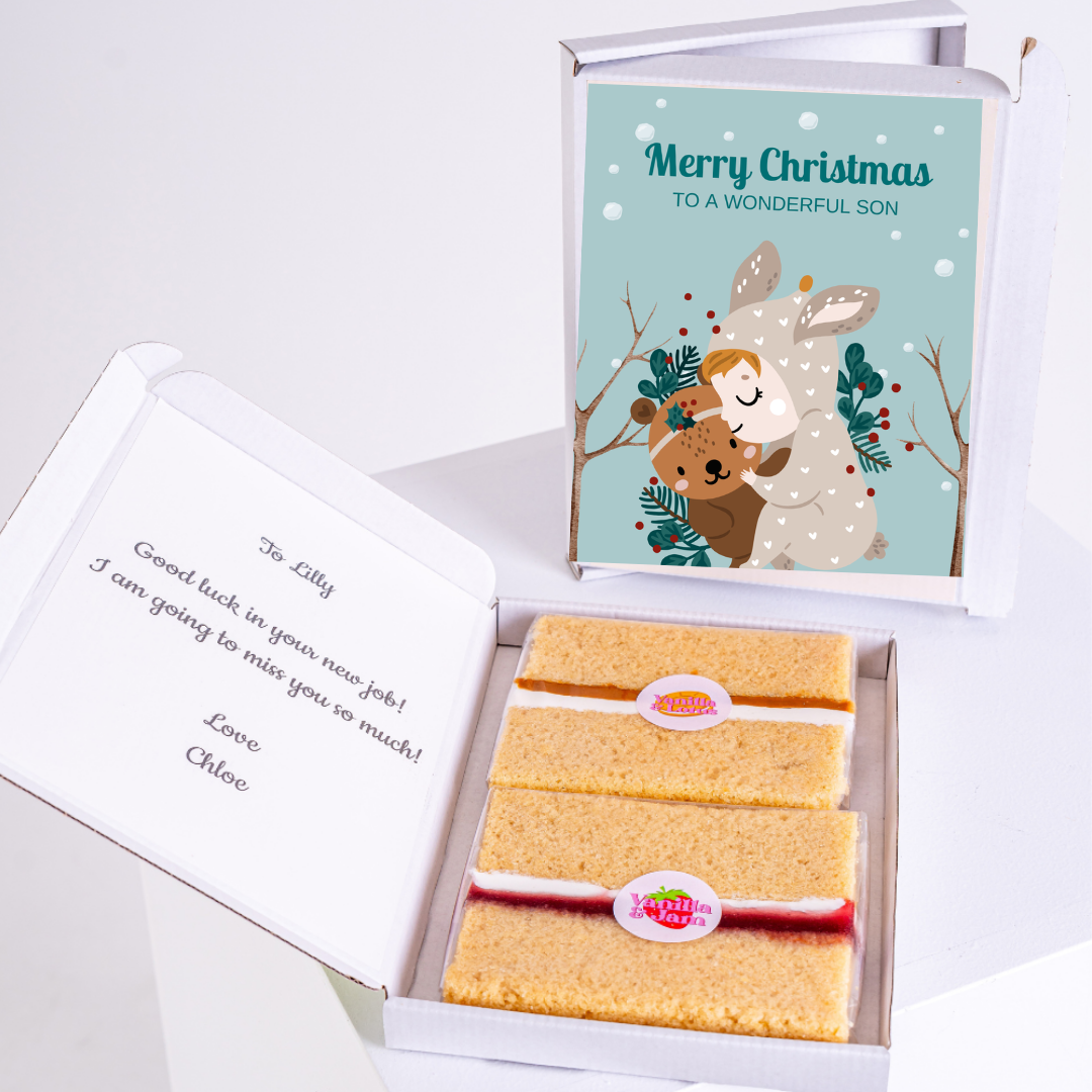 Christmas gift box with cake and Merry Christmas to a wonderful son card.