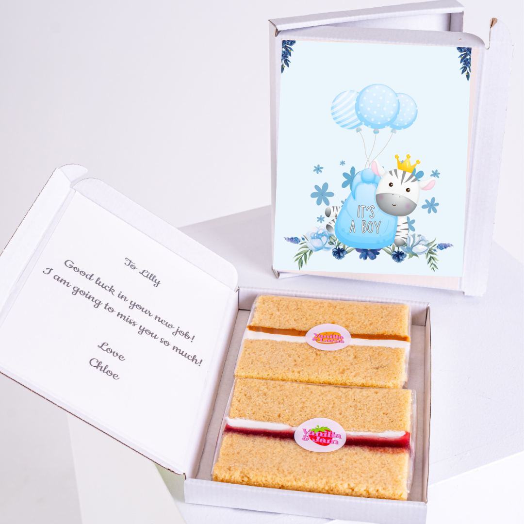Baby gift box with cake and card saying It's a Boy