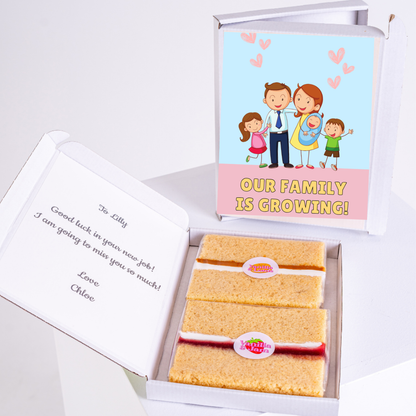 Gift box with Our Family is Growing design and cake slices for Lilly.