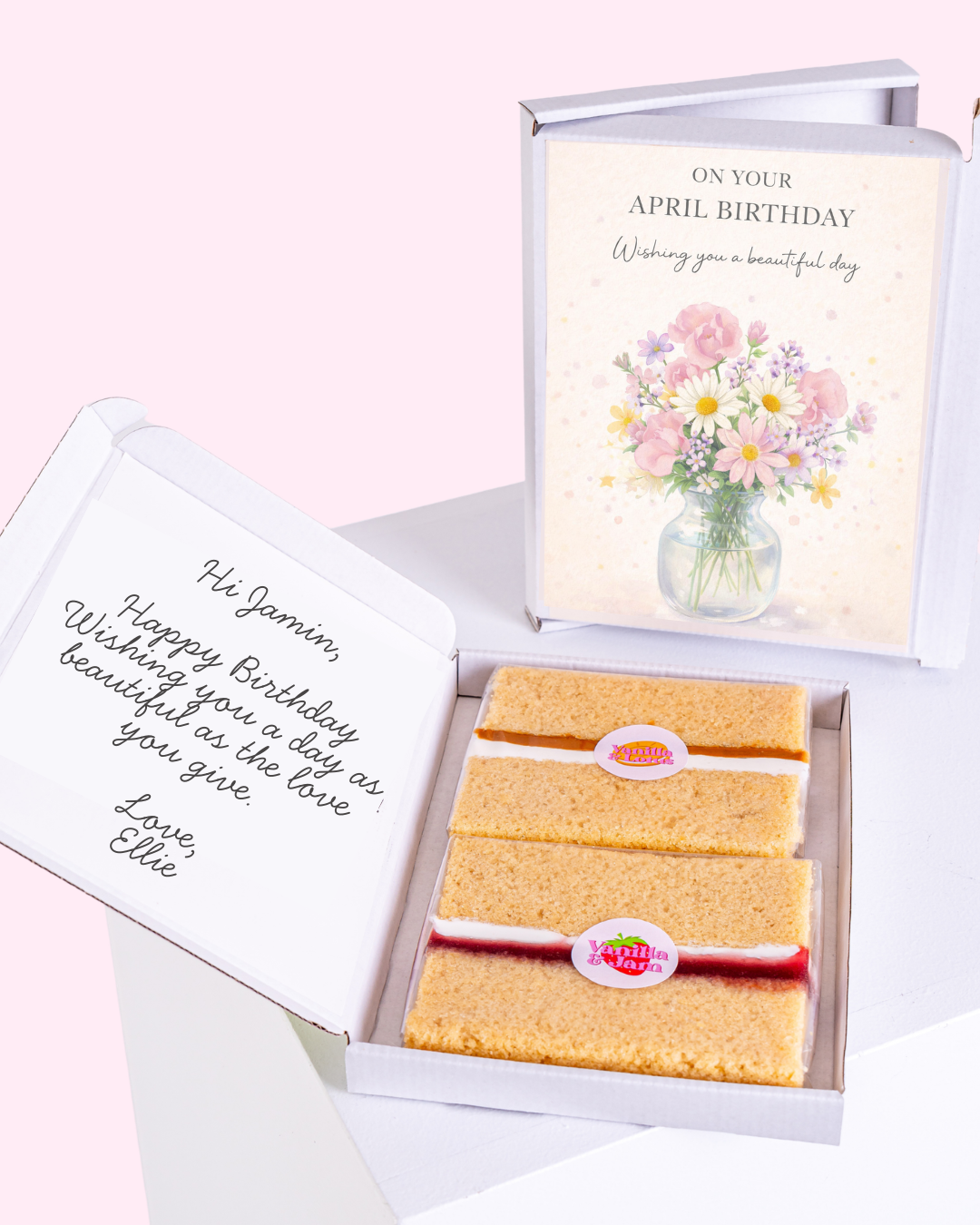 Elegant April birthday cake gift box with soft floral bouquet artwork and pastel birthday message design