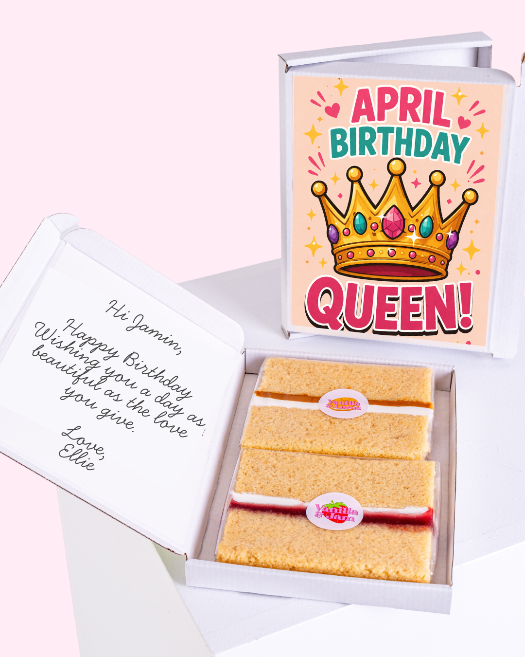 April birthday cake gift box featuring a colourful queen crown illustration with bold pink typography and sparkles