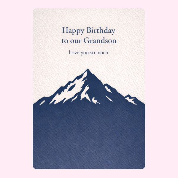 happy birthday grandson card design with blue mountain illustration and heartfelt message on cream background