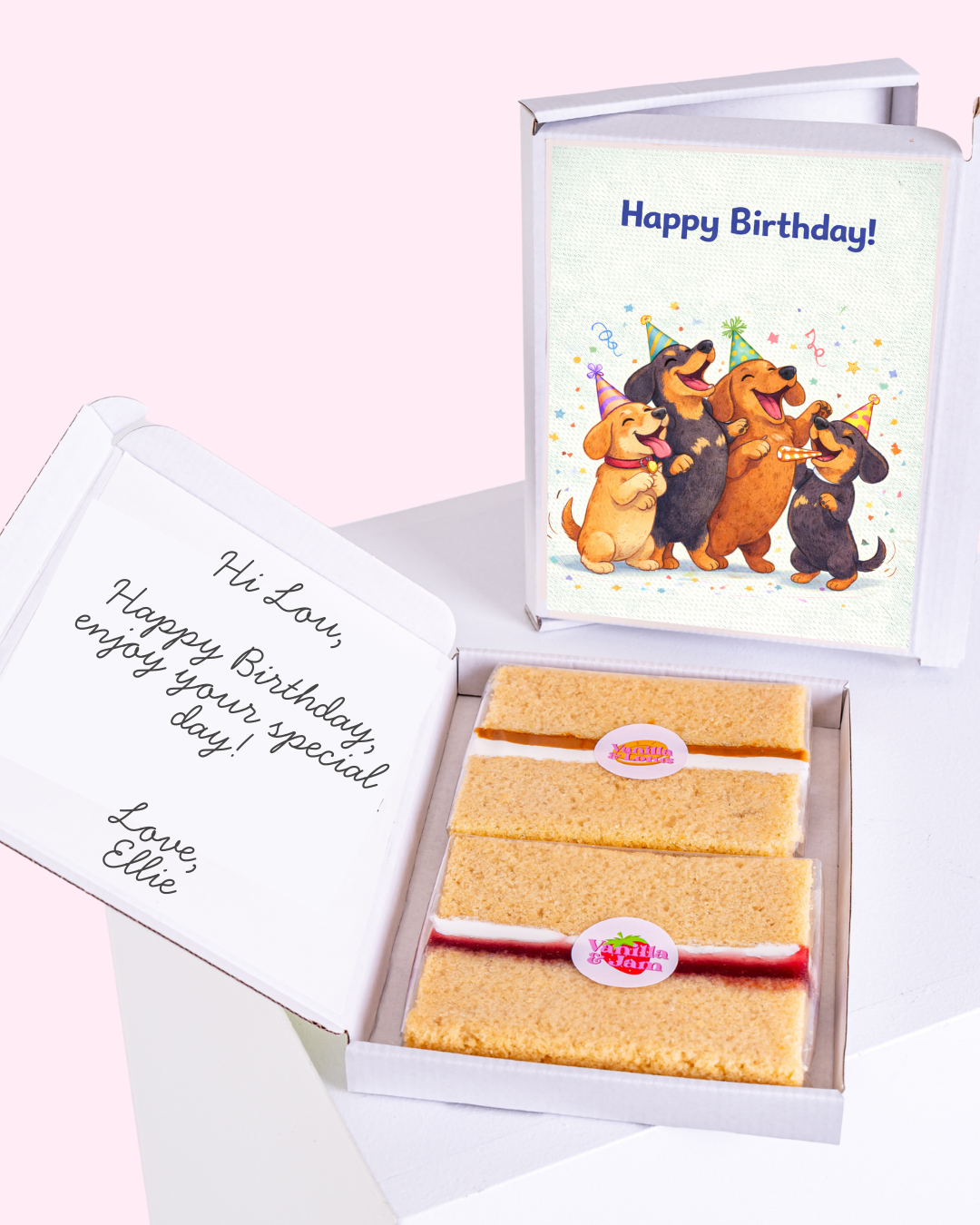 Birthday gift box with cake slices and happy dogs birthday card inside