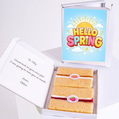 Bright spring themed cake gift box with colourful Hello Spring typography, sunshine and fluffy clouds design