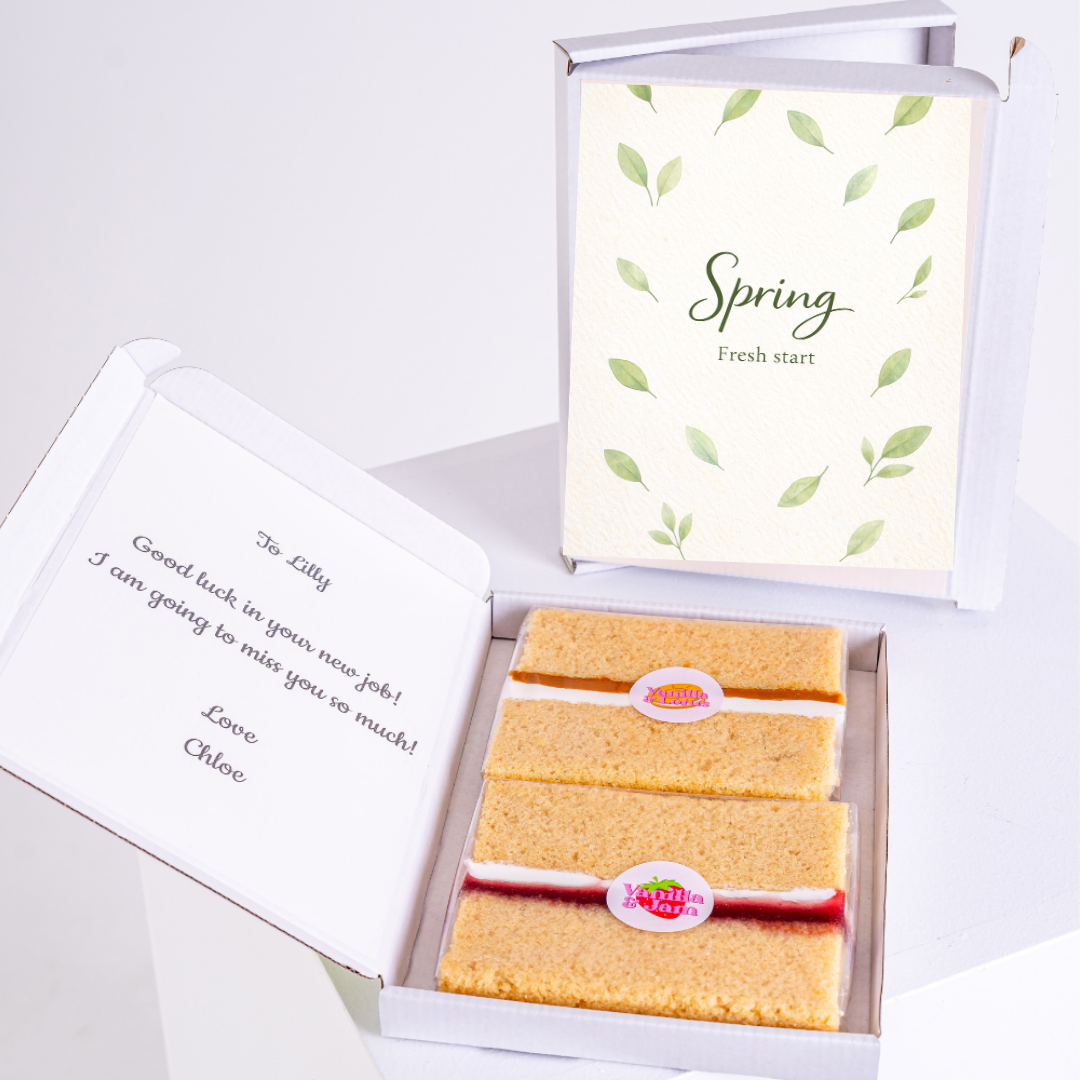 Spring themed cake gift box with soft green leaf pattern and minimalist fresh start greeting