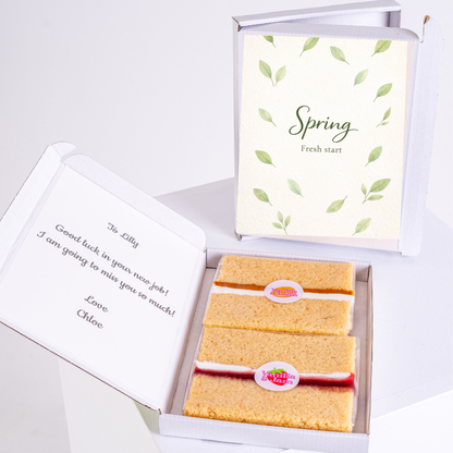 Spring themed cake gift box with soft green leaf pattern and minimalist fresh start greeting