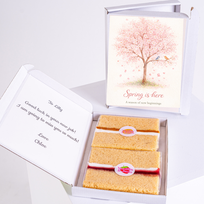 Spring themed cake gift box with blooming cherry blossom tree, birds and Spring Is Here seasonal design
