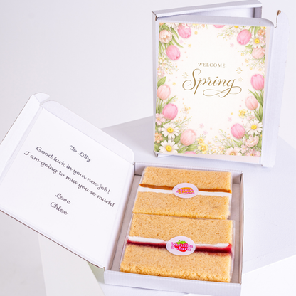 Spring themed cake gift box with pastel tulips, daisies and elegant Welcome Spring floral greeting design